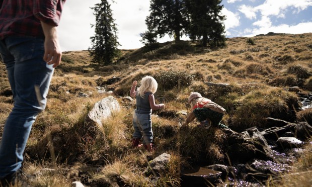 Young children playing outdoors