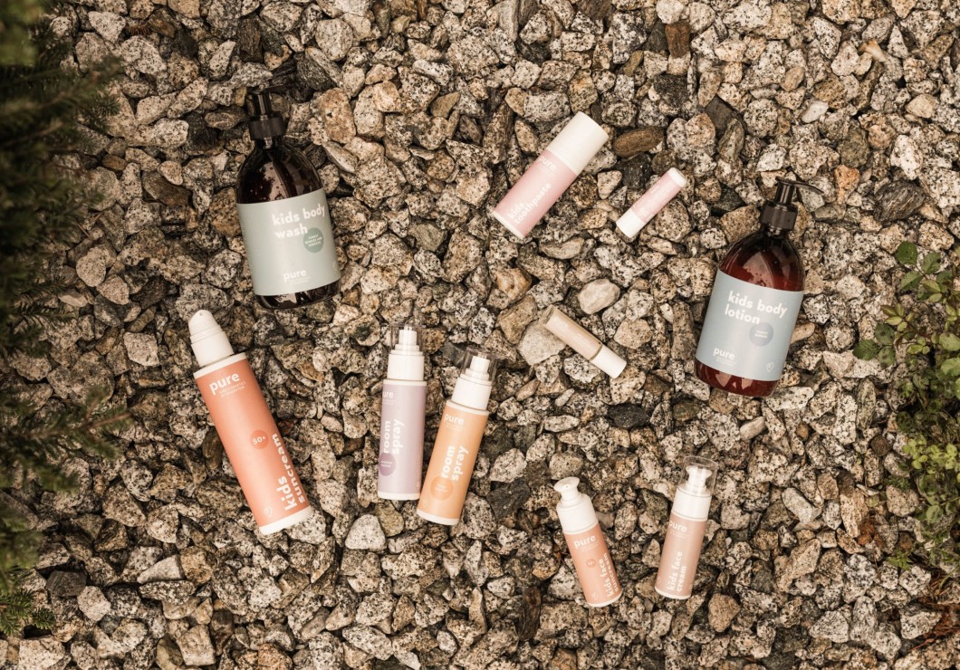 The pure new children's cosmetics line pure - kids cosmetics by Feuerstein lies on gravel in the middle of the Pflersch nature reserve.