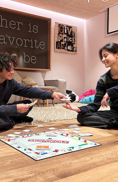 Children play board games in the teen room