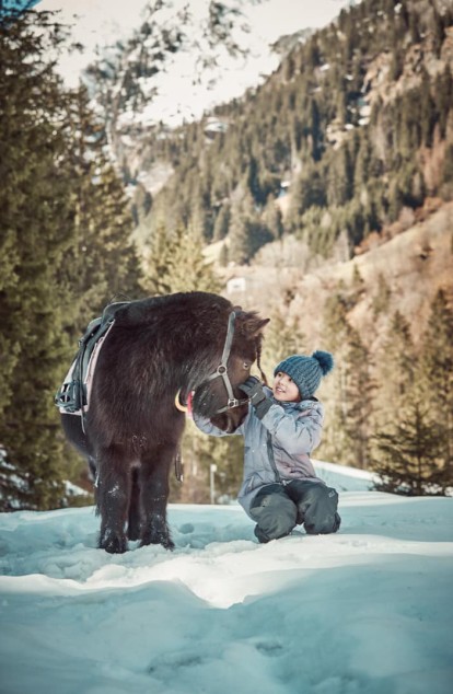 Reiturlaub im Familienhotel Feuerstein, dem idealen Ort für einen Familienurlaub in den Bergen